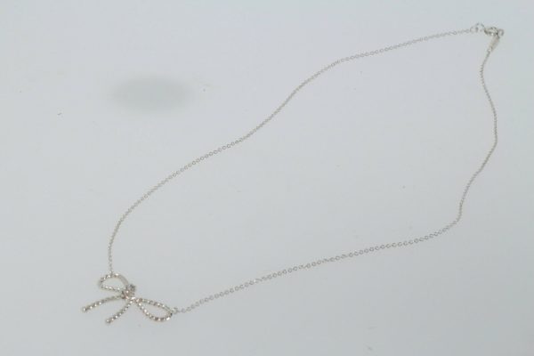 Tiffany & Co.Sterling Silver Twist Ribbon Bow Pendant Necklace